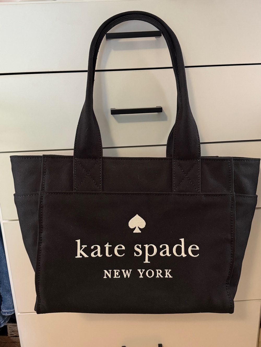 kate spade black canvas tote with white logo